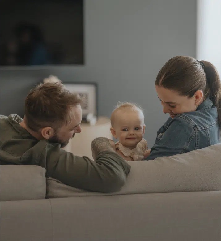 Young family with their baby at home